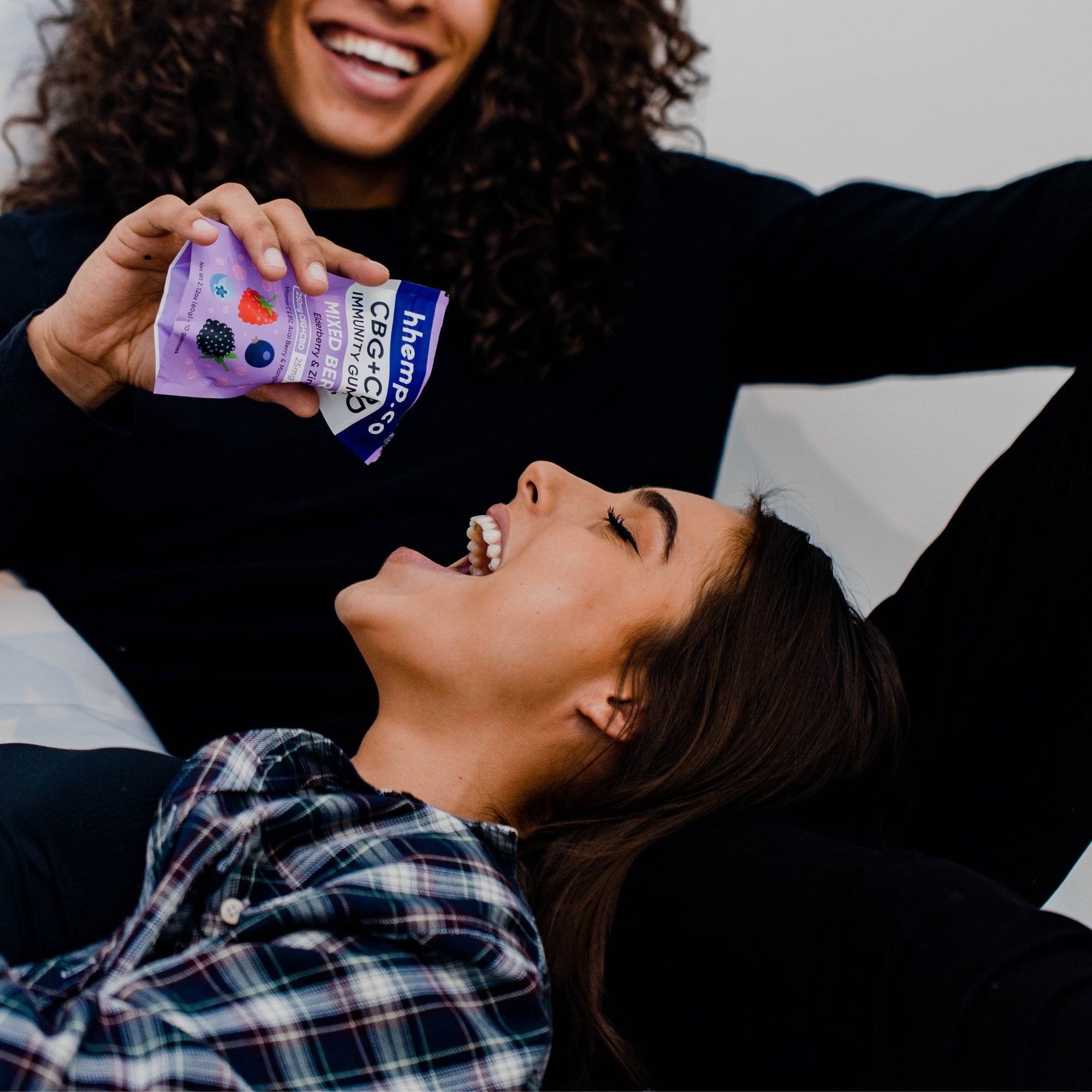Happy couple eating hemp infused edibles during their date.